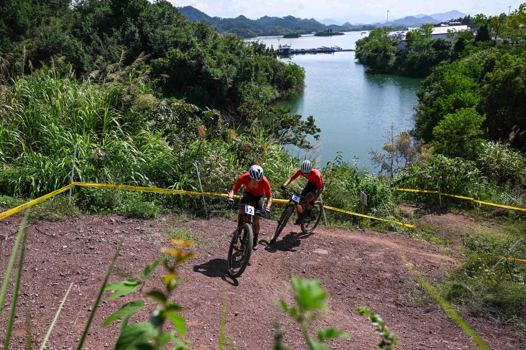 自行车开纳米体育赛 中国队包揽山地自行车两金(图2)