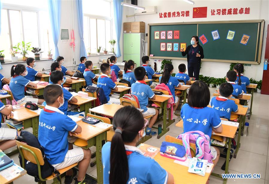 More primary schools reopen in China - Xinhua