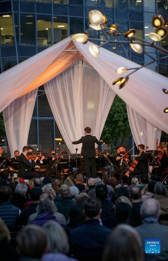 Musicians of Vancouver Symphony Orchestra perform at outdoor 