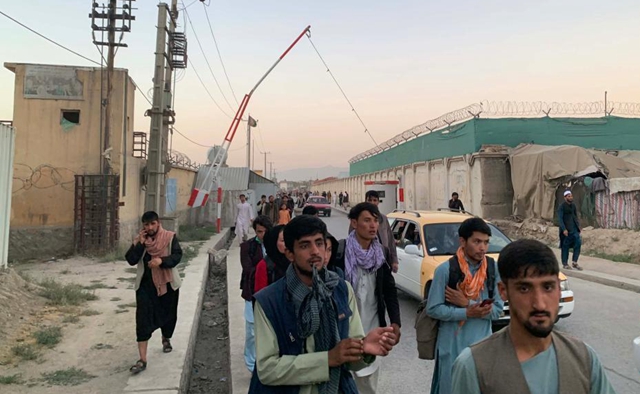 Death toll from Kabul airport attacks rises to 103, Taliban official says no evacuation deadline extension