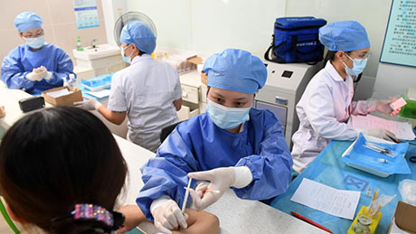 Over 2 bln doses of COVID-19 vaccines administered in China