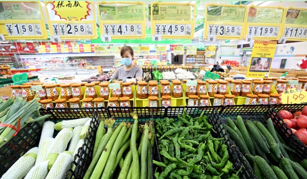 China's consumer inflation edges up to 2.3 pct in November