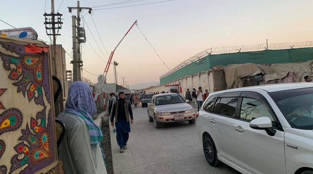 Death toll from Kabul airport attacks rises to 103, Taliban official says no evacuation deadline extension