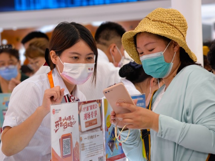 GLOBALink | Vlog: Using e-CNY at CIFTIS