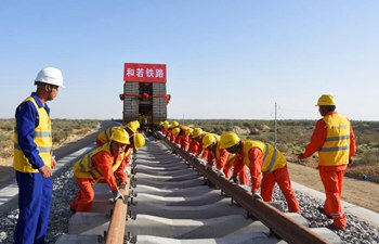 China Focus: Track-laying work completed for major railway in China's Xinjiang