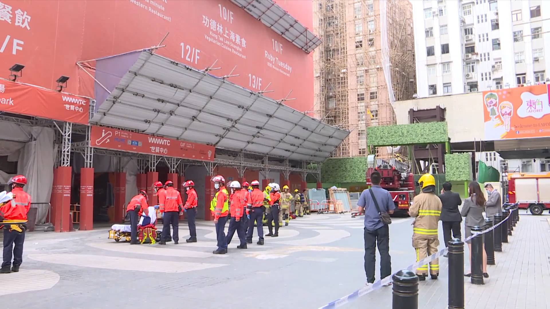 GLOBALink | 12 hospitalized after major fire at Hong Kong's World Trade Center