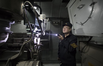 Pic story: generator car staff work on train in NE China's Heilongjiang