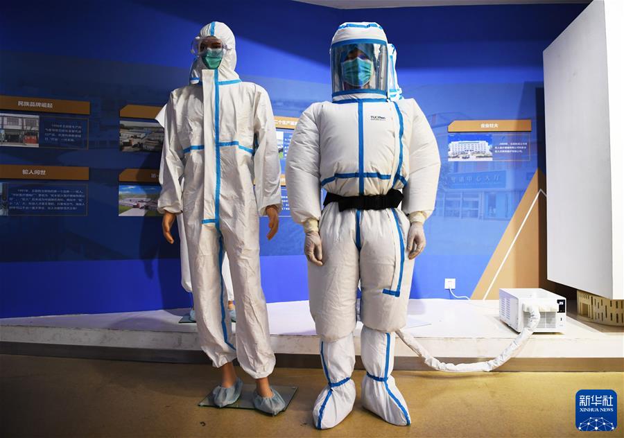 (镜观中国·新华社国内新闻照片一周精选)(14)探秘“空调防护服”