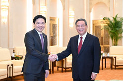 李強會見新加坡副總理兼財政部長黃循財
