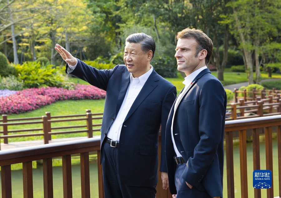 习近平同法国总统马克龙在广州非正式会晤(图2)