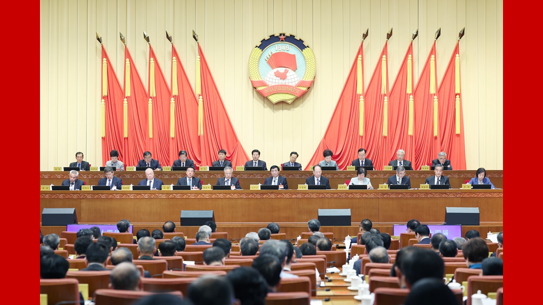 全国政协十四届常委会第四次会议举行全体会议 王沪宁出席