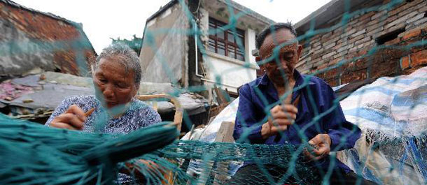 八旬老人替儿还债 “诚信老爹”感动乡邻