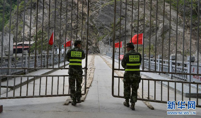 留守灾区 坚守国门