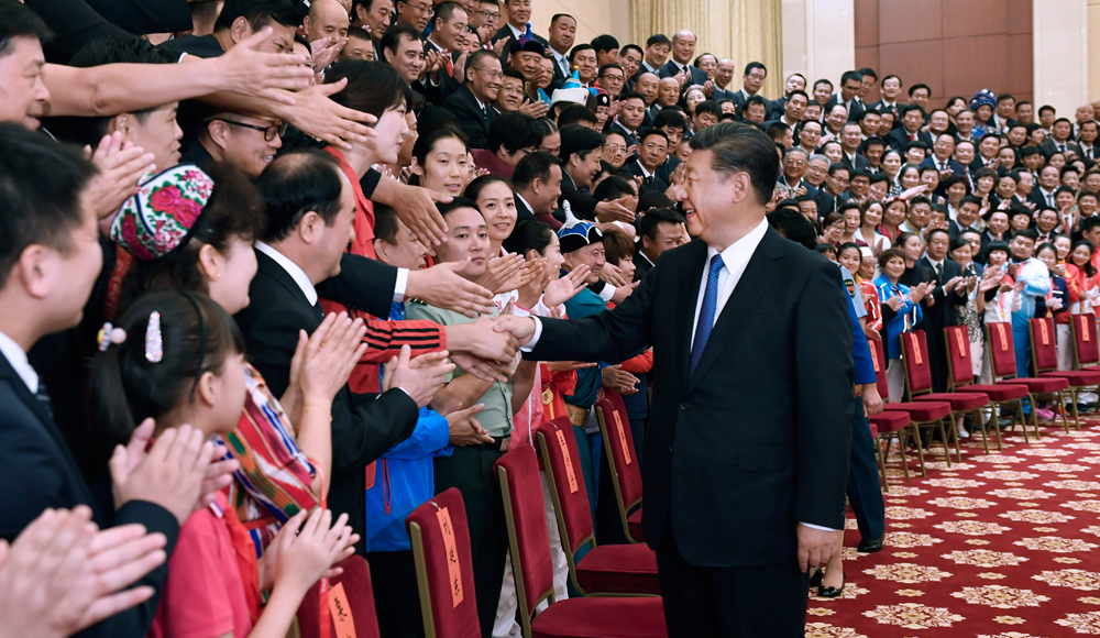 习近平会见全国体育先进单位和先进个人代表等