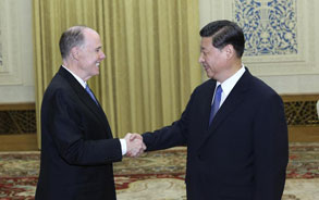 习近平会见美国总统国家安全事务助理多尼隆