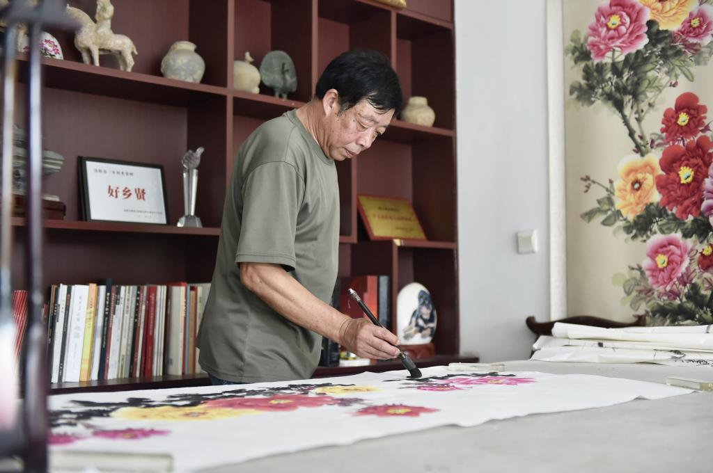 传艺助振兴&mdash;&mdash;丹青巧绘牡丹红