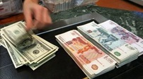俄罗斯：俄卢布对美元汇率继续大跌