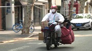 现场直击：增援上海的快递小哥工作顺畅吗？