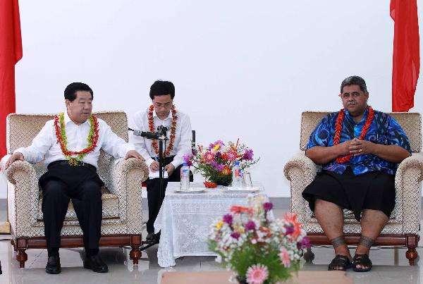 贾庆林会见萨摩亚议长拉乌利