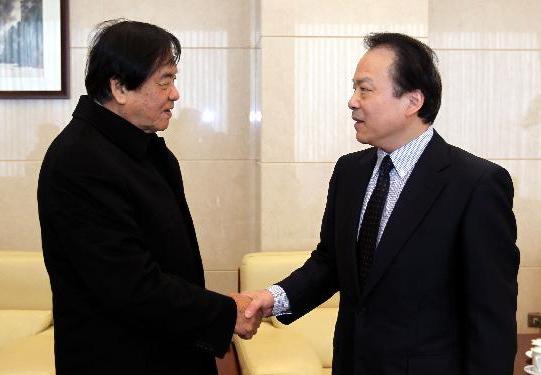 何平会见马来西亚世界华文媒体集团主席张晓卿