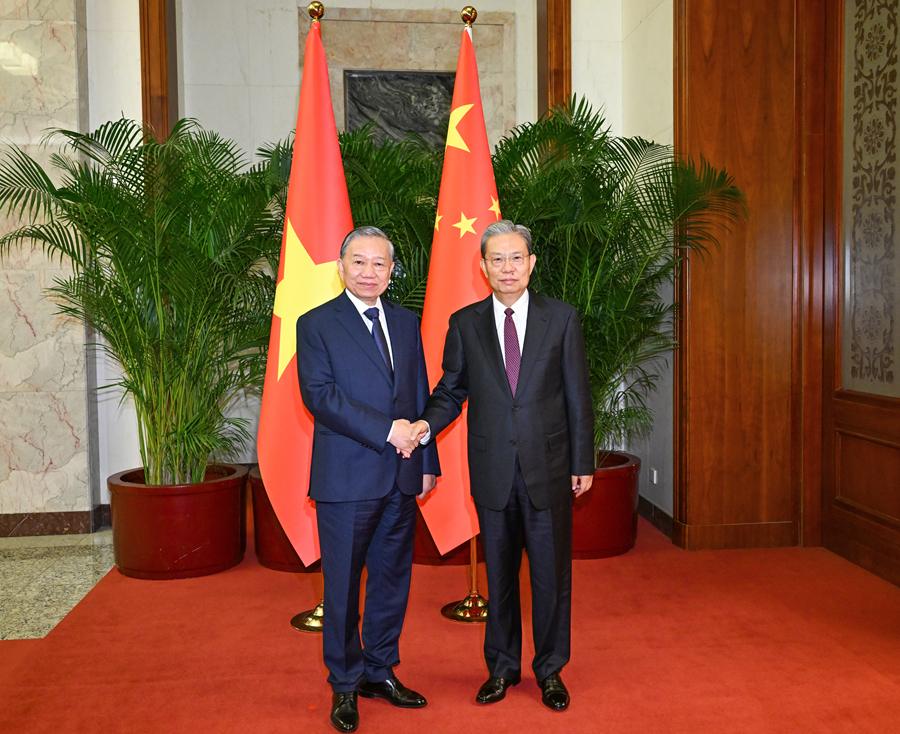 赵乐际会见越共中央总书记、国家主席苏林