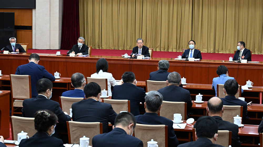 赵乐际看望九三学社、无党派人士界委员并参加讨论
